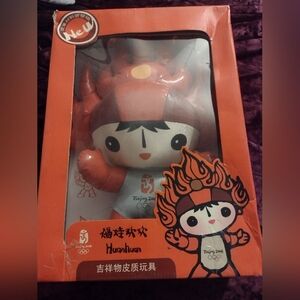 Red and White Stuffed Animal Toy with Cute Design